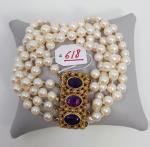 Un bracelet souple composé de cinq rangs de perles de...