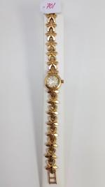 REC : montre-bracelet de dame en or jaune - mouvement...