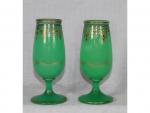 Une paire de vases en opaline verte - à décor...