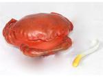 Un pot à "rouille" en forme de crabe en porcelaine...
