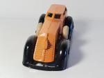 MANOIL (USA, v.1937) coupé futuriste orange/noir à phare central, L :...