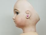 Une poupée JUMEAU taille 12, tête de porcelaine bouche fermée,...