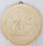 *Un médaillon en céramique à décor d'Eros, Vénus et Amour...