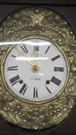 Une horloge de parquet, cadran émaillé signé A. MASSON à...