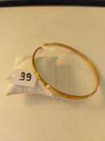 Bracelet rigide ciselé diamètre 6,3cm env. or 18 carats poids...