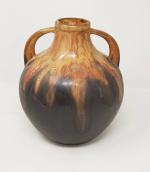 Gilbert METENIER (XXe siècle) - Un vase en grès flammé...
