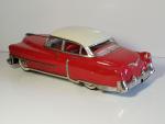 JOUSTRA (v.1960) Cadillac en tôle laquée rouge/toit ivoire, L :...