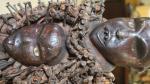 Un fétiche anthropomorphe Nkisi Bakongo - bois sculpté polychrome, clous,...