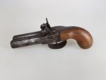 Un pistolet à percussion - canons juxtaposés - époque XIXème...