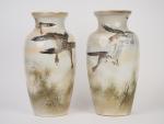 Paire de vases balustres fin XIXème en porcelaine polychrome du...