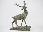 T. CARTIER.
"Le cerf".
Sculpture en bronze à patine verte. 
Signée.
Dim: 44...