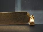 Pendentif style égyptien en or. 
Poids : 2,20 g