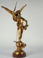 E. FREMIET. "Saint Michel terrassant le dragon".
Sculpture en bronze doré,...