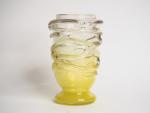 SCHNEIDER.
Vase "Cordée" en verre incolore, poudré jaune à la base...