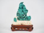 Groupe en turquoise "Guanyin et un enfant assis sur un...