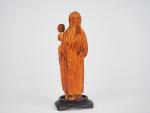 Vierge à l'Enfant en ivoire sculpté en ronde-bosse. Marie est...
