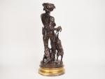 Henri PLE.
"Le piqueux"
Sculpture en bronze à patine brune, sur son...