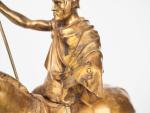 E. FREMIET.
"Cavalier romain".
Sculpture en bronze doré.
Signée et titrée sur la...