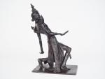 Léopold SAVINE.
"Danseuse asiatique".
Sculpture en bronze à patine médaille.
Signée, cachet de...