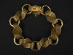 Bracelet articulé en or jaune, composé de maillons ronds et...