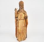 Sculpture XVIIIème en bois polychrome et doré "Saint Evêque".
H. 77...