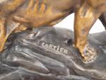 CARTIER.
"Tigre rugissant". 
Sculpture en régule polychrome.
Dim. 24,5 x 30 cm.