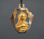 Médaille religieuse ajourée de style Art déco trois tons d'or,...