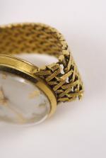J&EGER LECOULTRE. Montre de dame, bracelet et cadran en or....