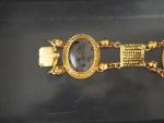 Bracelet articulé Napoléon III en or jaune, à décor de...