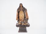 Sculpture début XVIIème en bois polychrome "Vierge en majesté".
(manques les...