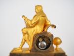Pendule Napoléon III en bronze doré figurant un géographe, cadran...