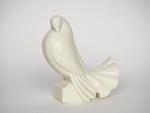ADNET. 
"La colombe". 
Sujet en céramique blanche 
Signé.
H. 20,5 cm