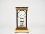 Pendule cage XIXème de style Louis XVI en verre et...