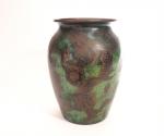 WMF.
Vase en dinanderie Art Déco à décor de motifs japonisants...