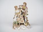 Groupe en porcelaine polychrome de Saxe XIXème, "scène galante".
Signé.
Dim. 19...
