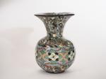 GERBINO.
Vase boulle à col évasé en céramique polychrome de Vallauris.
Signé
H....