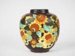 KERAMIS.
Vase à panse applatie en céramique à décor de fleurs...