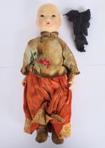 Une poupée fabrication Chine 1950.