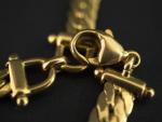 Bracelet souple en or jaune, maille anglaise alternée de motifs...