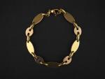 Bracelet souple en or,composé de maillons ronds et maillons ovales...