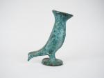 Sujet en céramique verte en forme d'oiseau.
H. 22 cm