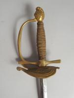 Epée d'officier premier Empire. Monture en bronze, plateau de garde...