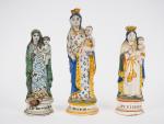Trois différentes Vierges XIXème en faïence polychrome 
(accidents).
H. 25 cm,...
