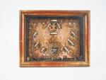 Reliquaire XIXème en paperolle, cadre baguette doré.
Dim. 25 x 31...