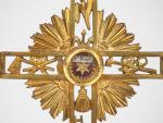 Crucifix reliquaire XIXème en bronze à décor des instruments de...