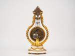 Pendule lyre Louis XVI en bronze ciselé, doré et marbre...