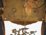 Cartel Napoléon III de style Louis XV en marqueterie Boulle,...