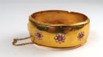 Bracelet manchette Napoléon III en or, orné de rubis dans...