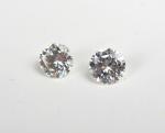 2 diamants sur papier de 0,58 carat (I VVS1) et...