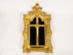 Crucifix en ivoire XIXème dans un cadre en bois doré...